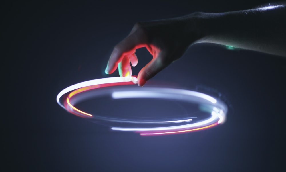 Hand controling light circle in air